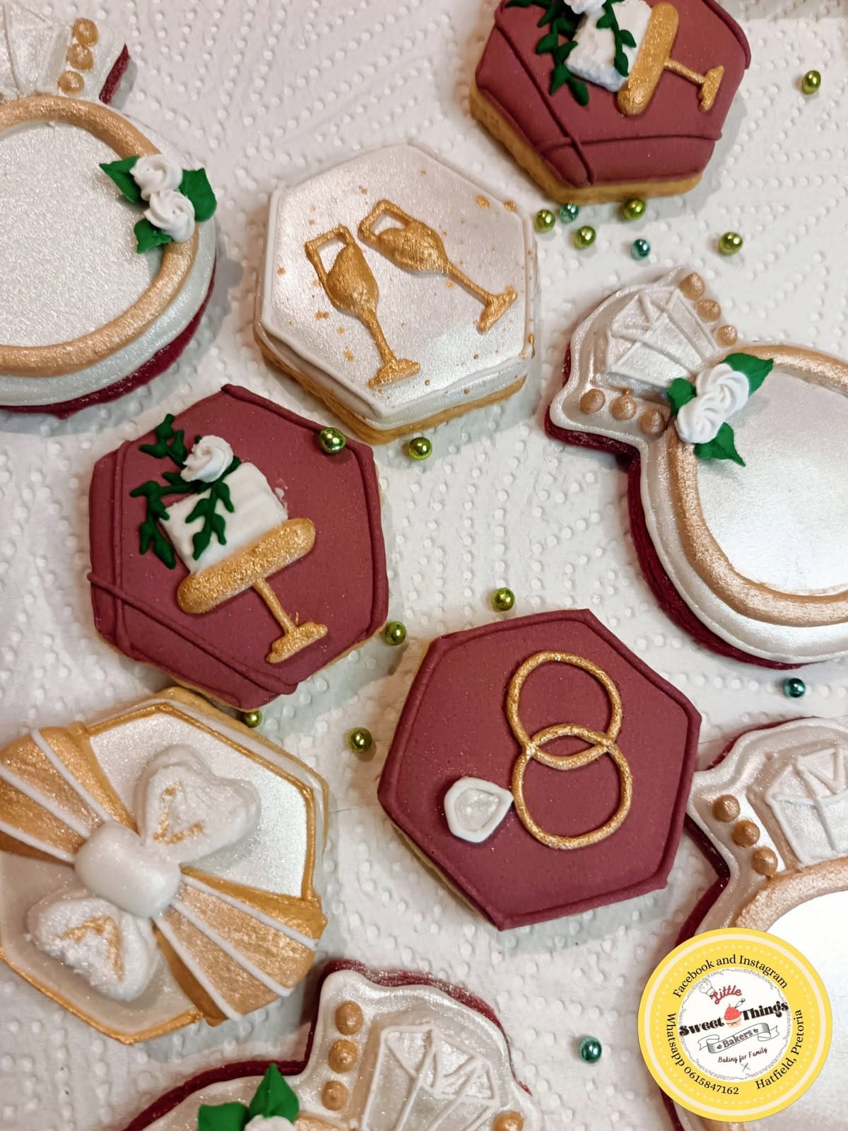 Graduation-themed decorated cookies by Little Sweet Things Bakers